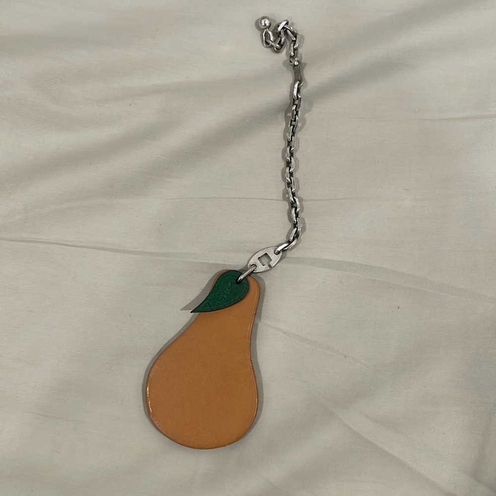 Pre-owed Hermes Pear Tan Leather Silver Bag Charm